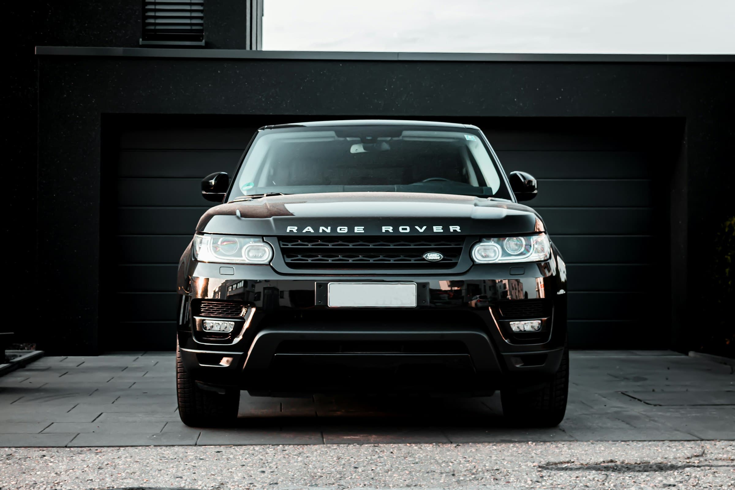 A fleet of vehicles ready for a corporate arrival